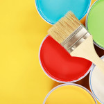 Paint cans color palette with paint brush on yellow background,h