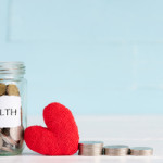 Money saving and health care concept. A jar contains coins with